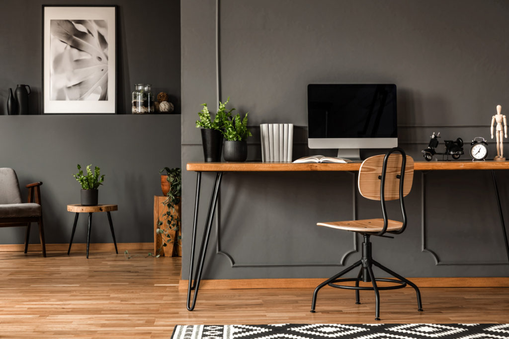 modern minimalistic basement office interior with grey walls