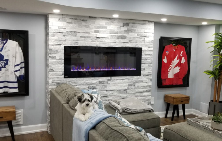 custom living room with luxury wall decor - basement renovation