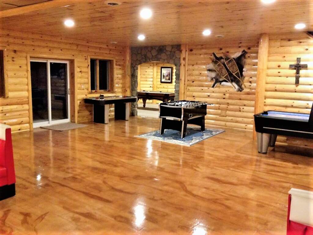 Custom Basement Game Room with Wooden Floor and Walls - Basement Design Markham 