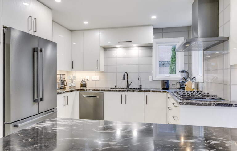  Modern and open concept basement kitchen renovation by Moose Basements